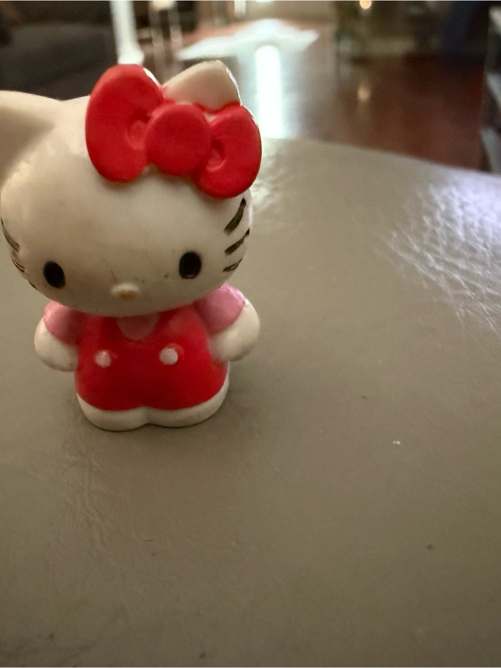 Hello Kitty Mini Figure with Red Bow and Pink Sleeves